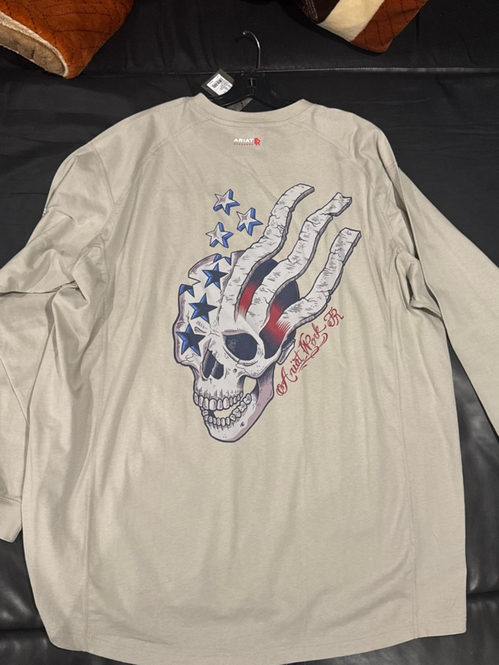 Ariat Long Sleeve Graphic Skull Tee in Light Gray with Red & Blue Accents